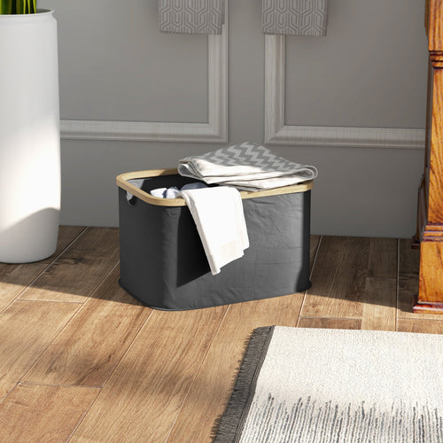 36L black foldable laundry basket with natural bamboo top and carry handles – eco-friendly, space-saving washing hamper.